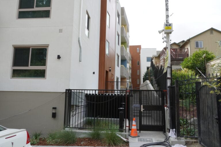 Fast Plank aluminum siding installation on Vista Wood apartment complex by Heritage Exteriors