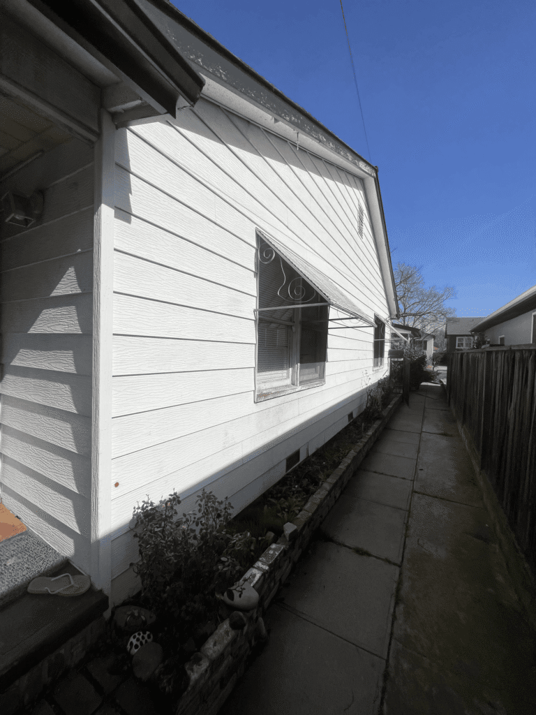 James Hardie board and batten siding with Amsco windows on Downtown Sacramento home