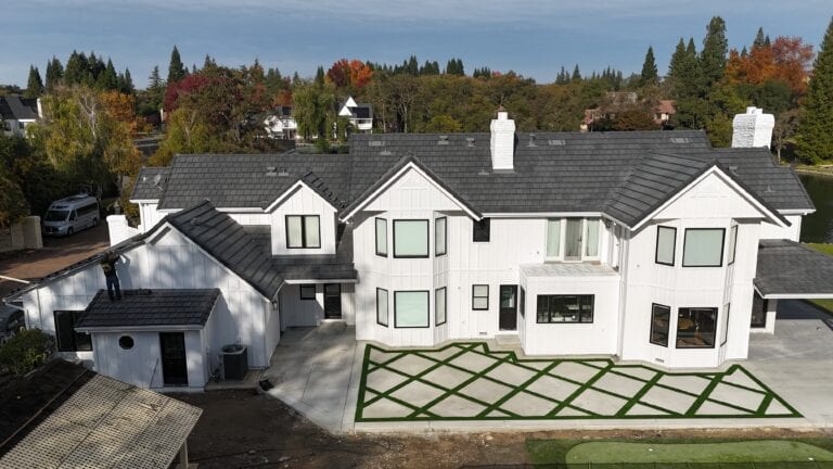 Close-up of James Hardie lap siding with dark window trim on Granite Bay residence