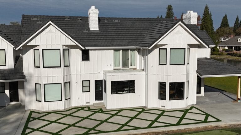 Close-up of James Hardie lap siding with dark window trim on Granite Bay residenceClose-up of James Hardie lap siding with dark window trim on Granite Bay residence