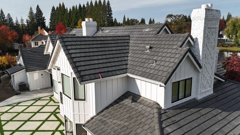 Side elevation of Granite Bay home with new fiber cement siding by Heritage Exteriors