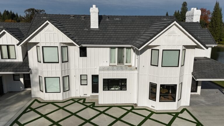 Close-up of James Hardie lap siding with dark window trim on Granite Bay residence