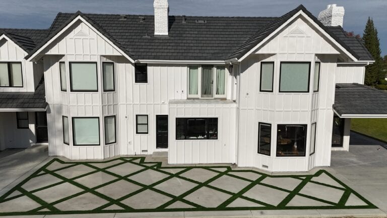 Close-up of James Hardie lap siding with dark window trim on Granite Bay residence