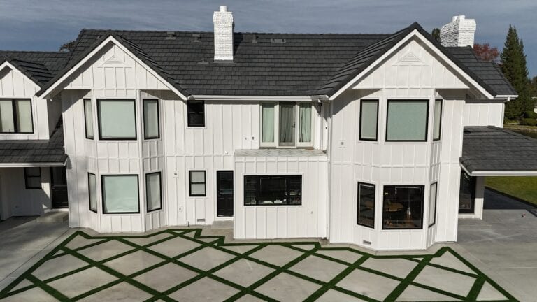 Close-up of James Hardie lap siding with dark window trim on Granite Bay residence
