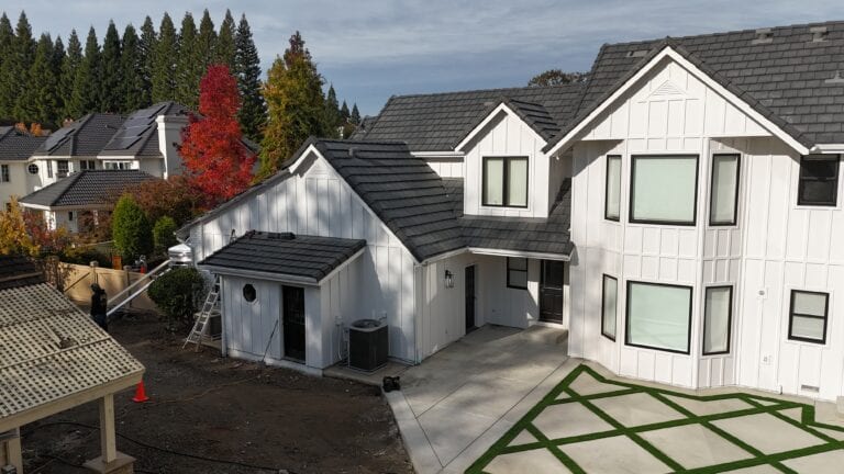 Side elevation of Granite Bay home with new fiber cement siding by Heritage Exteriors