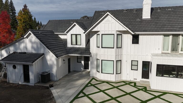 Side elevation of Granite Bay home with new fiber cement siding by Heritage Exteriors