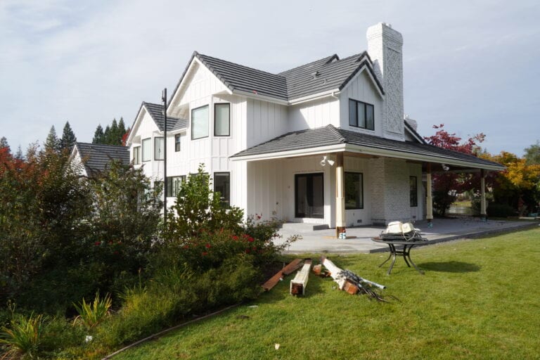 Side elevation of Granite Bay home with new fiber cement siding by Heritage Exteriors